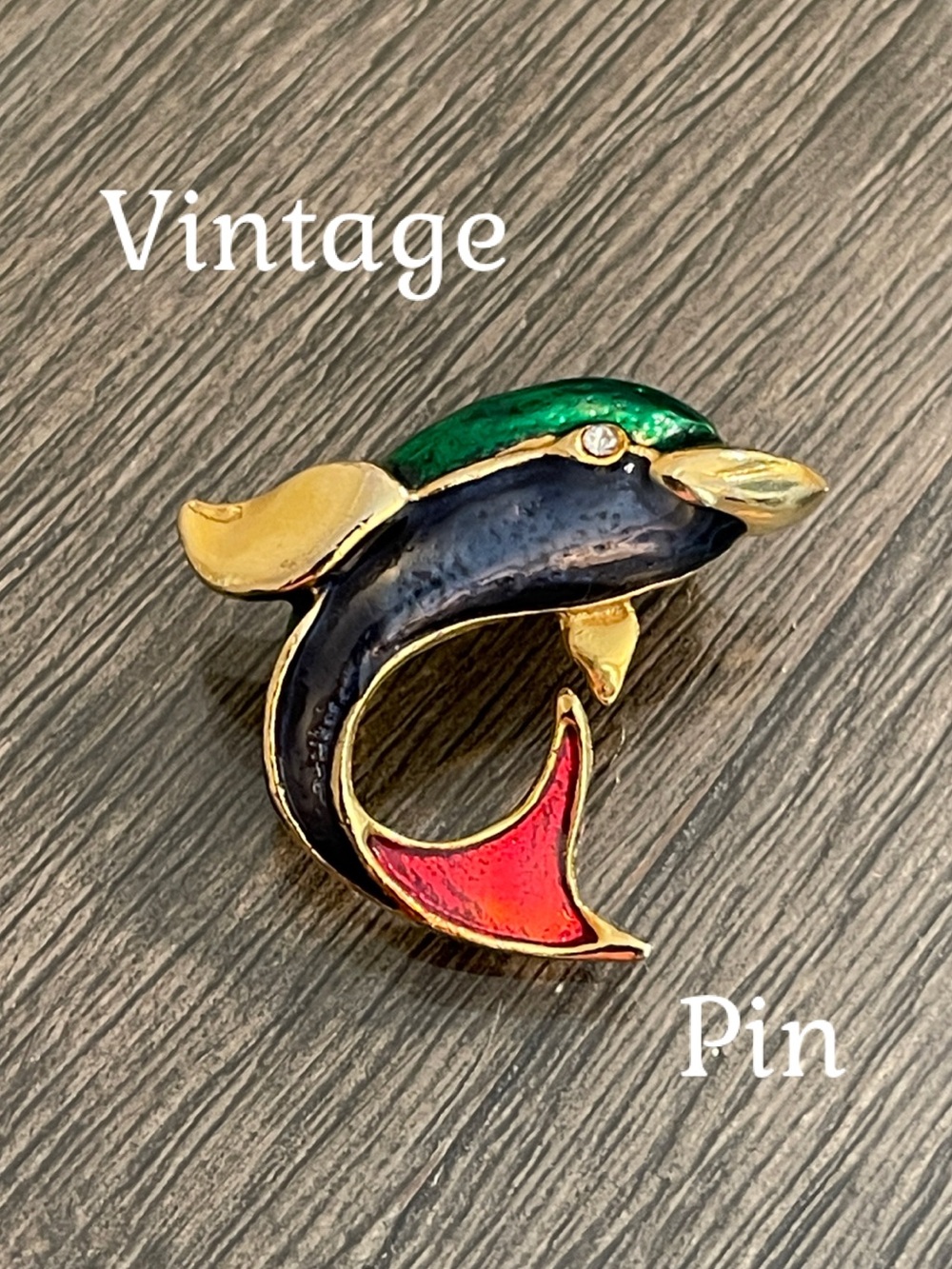 Vintage Gold-tone Dolphin Brooch with Colorful Enamel Accents